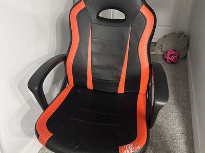 gaming chair, i also have a black office chair in much better condition if interested