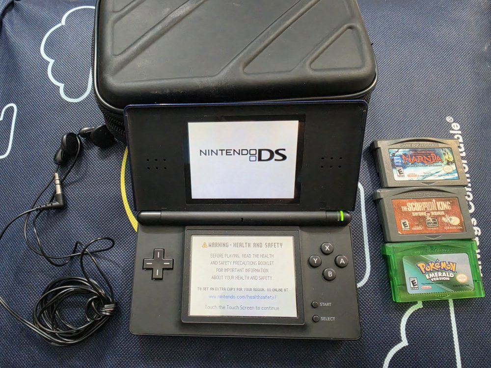 Nintendo DS Lite Black Handheld Console + Charger, Case, 9 Games