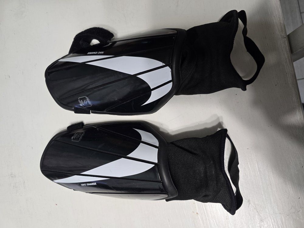 Adult Nike Charge soccer shin guards.