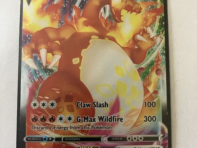 Charizard VMAX Pokémon Card - great condition.