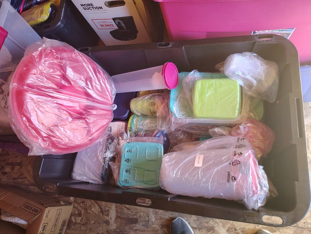 3 totes of Tupperware & 1 tote of Tupperware bags