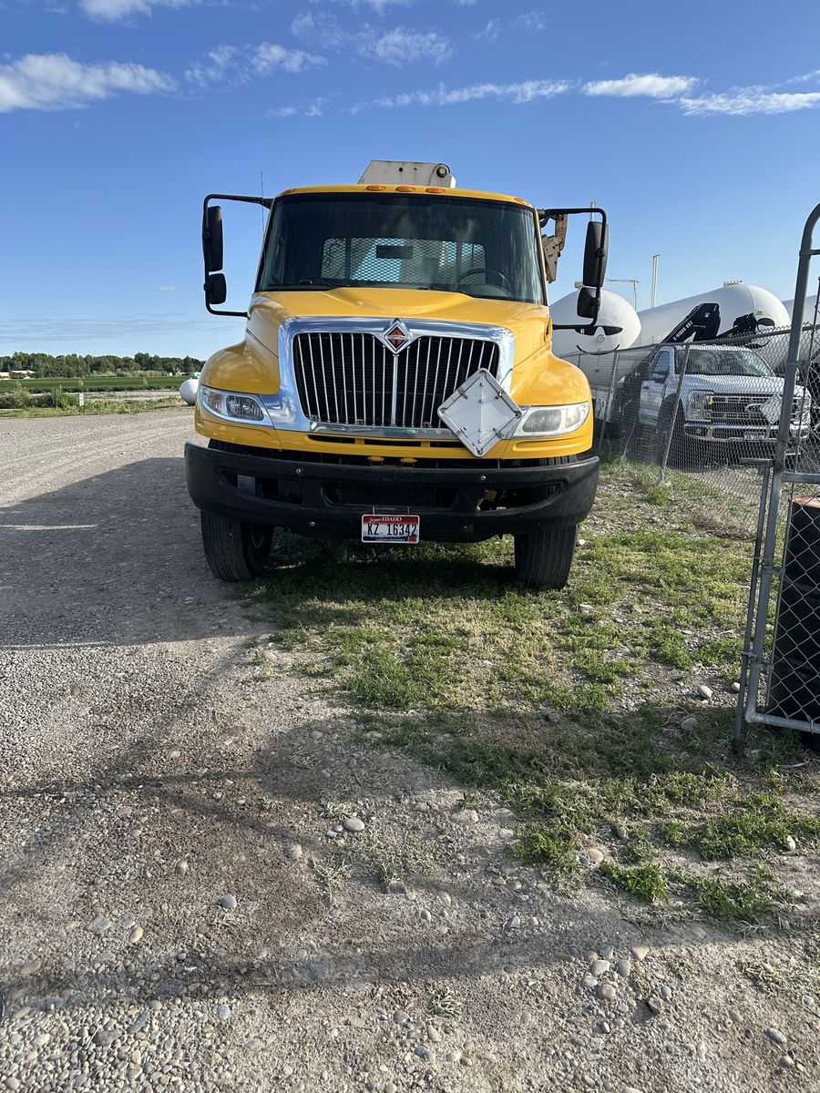 International Durastar 4300 with Skyco boom/crane 14’bed