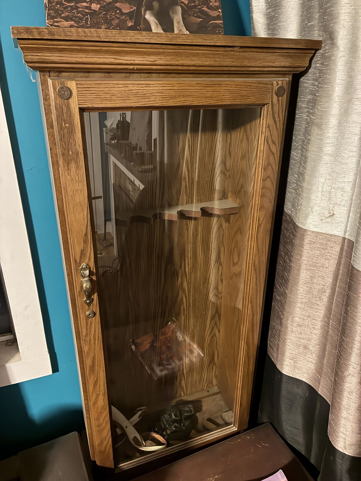 Antique gun cabinet