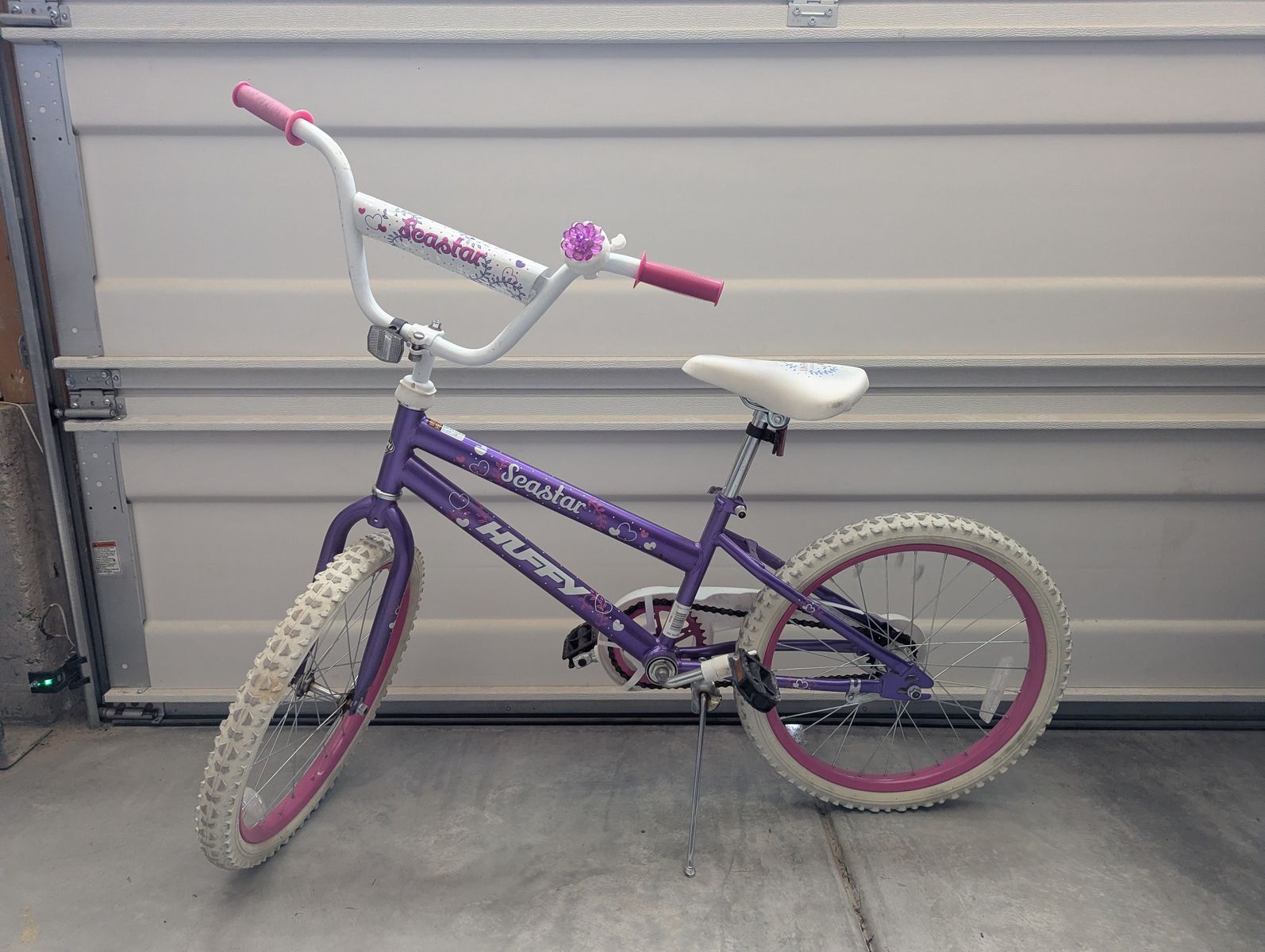 20" Purple Huffy Seastar Bike for girls, with flower bell