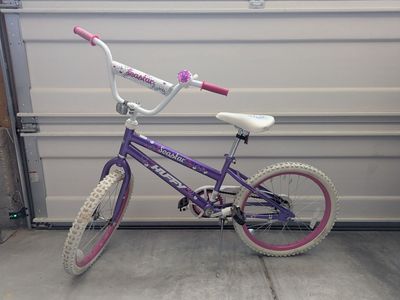 20" Purple Huffy Seastar Bike for girls, with flower bell