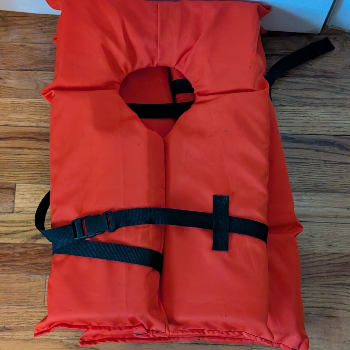 Two orange life jackets