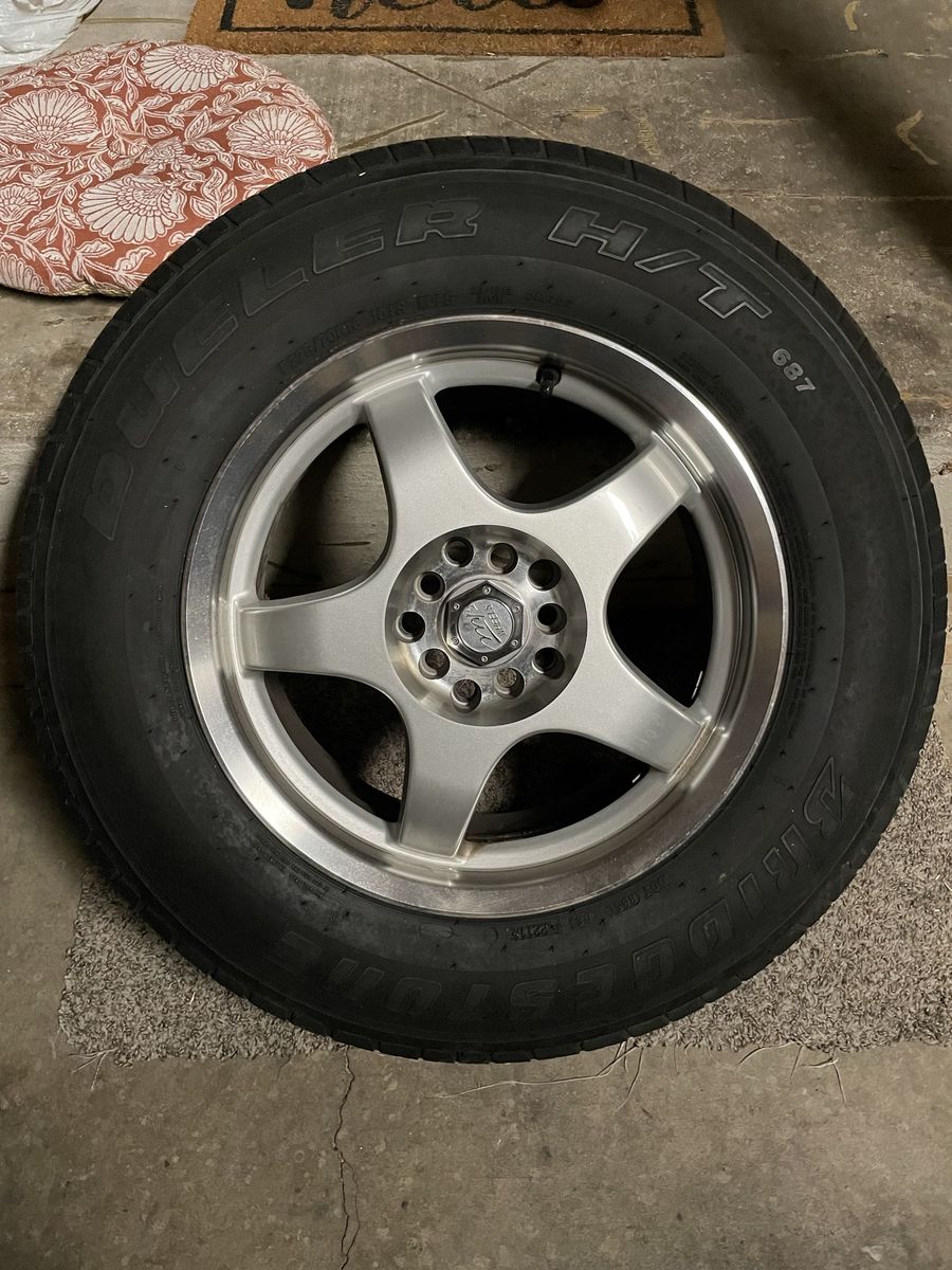 Set of 4 16x7 wheels and tires