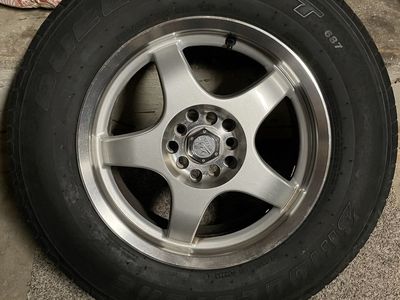 Set of 4 16x7 wheels and tires