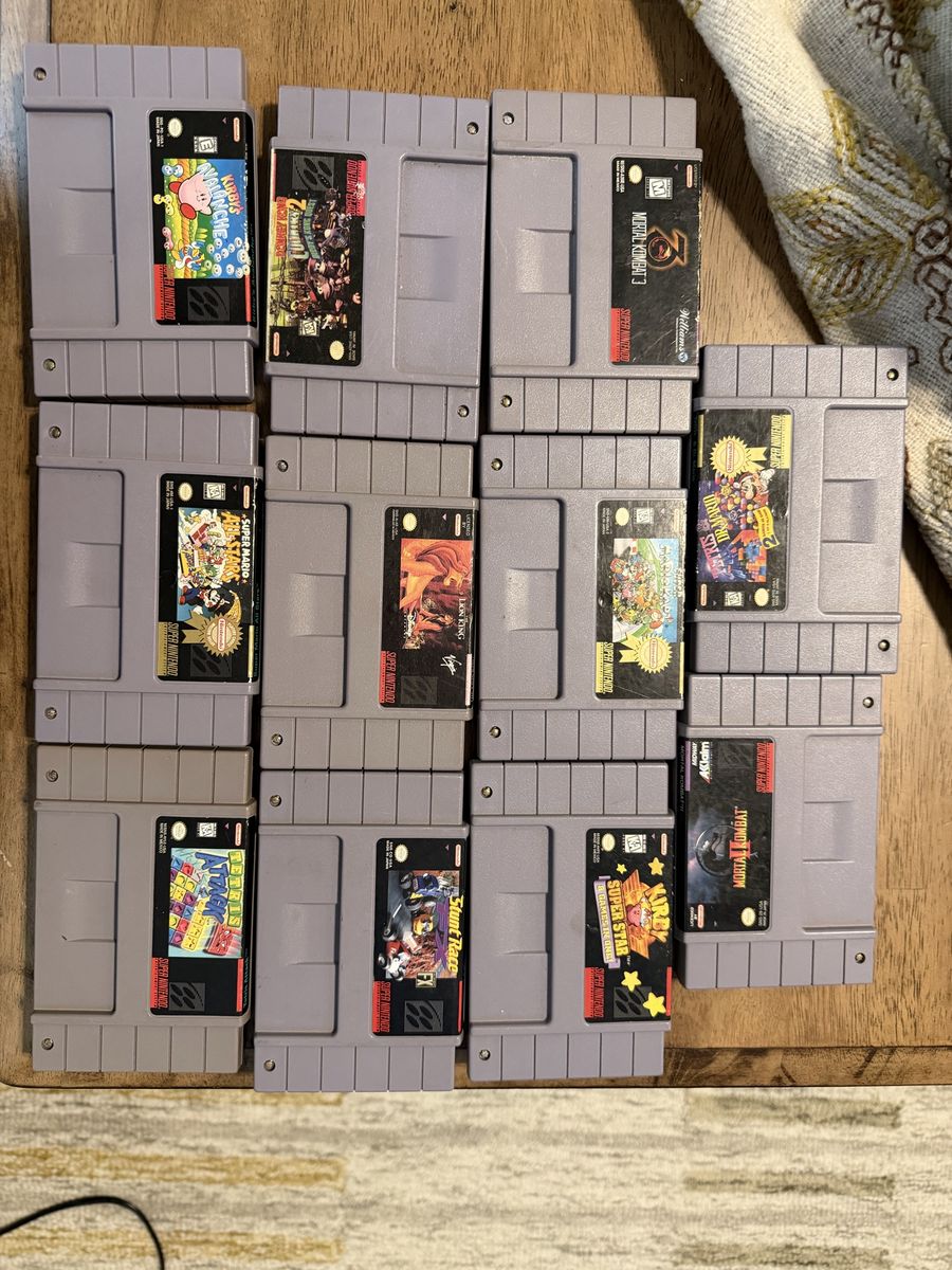 Lot of 11 SNES Super Nintendo Game Cartridges - Kirby, Mario, Mortal Kombat