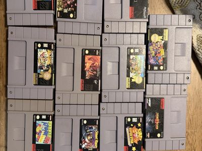 Lot of 11 SNES Super Nintendo Game Cartridges - Kirby, Mario, Mortal Kombat