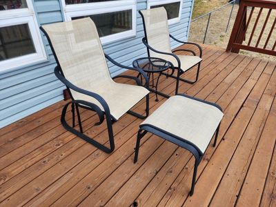 Outdoor chairs, ottoman and table