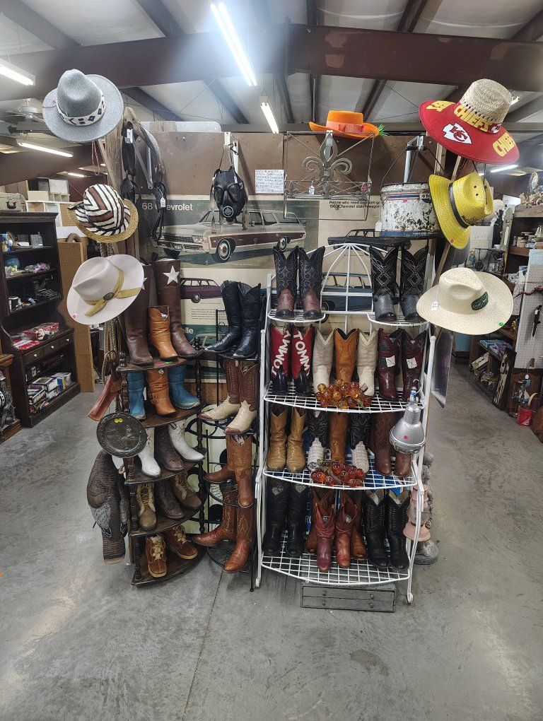 old signs lots of cowboy boots Springville