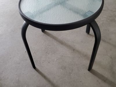 Round Glass Top Patio Side Table with Black Metal Frame - Good Condition