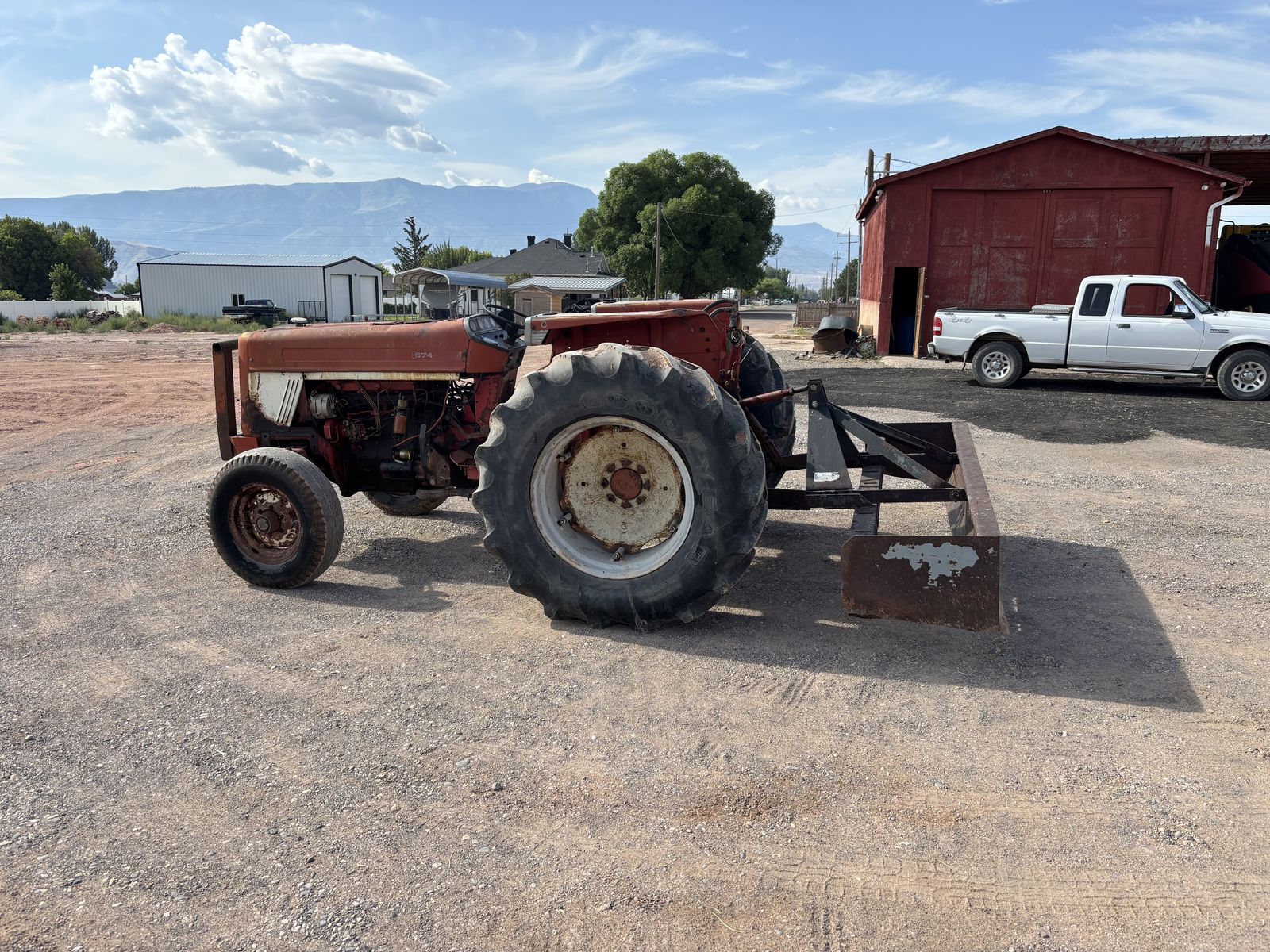574 international tractor with box scraper