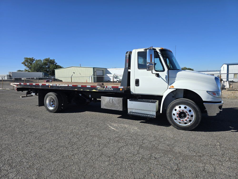 2015 International 4300 Roll Back Tow Truck