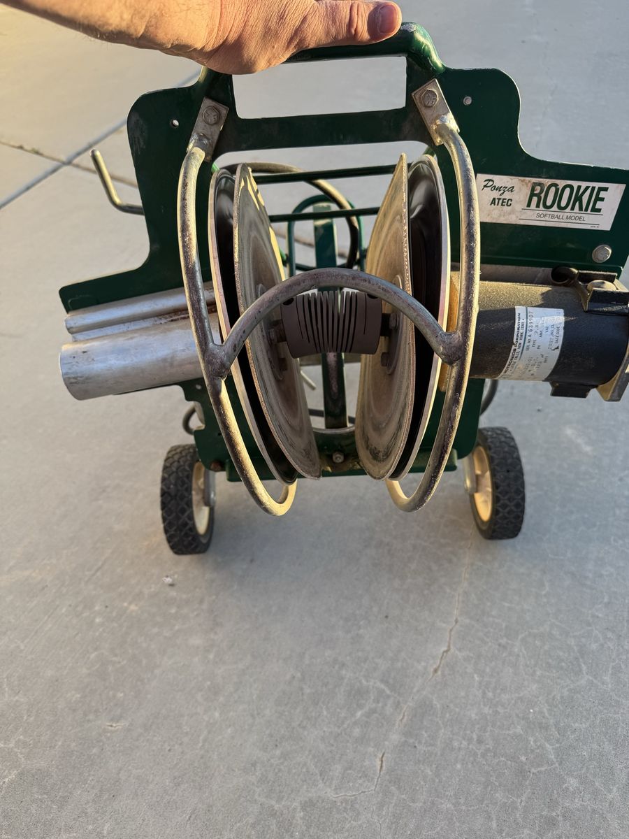 Softball fast/slow pitch machine. Ground/Flyball practice done with it as well. Make an offer