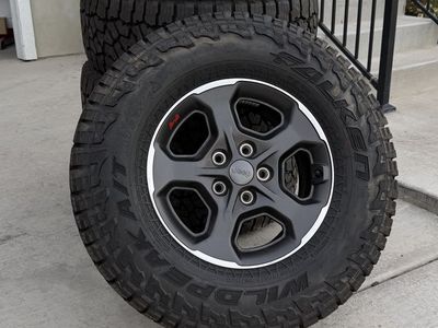 Jeep Gladiator Wrangler Rims and Tires 285/70R17 Falken Wildpeak AT3w new