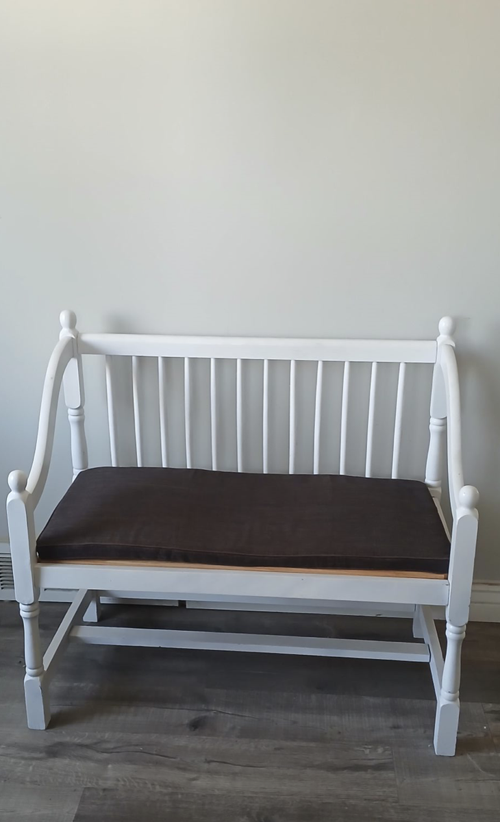 Wooden loveseat with cushion