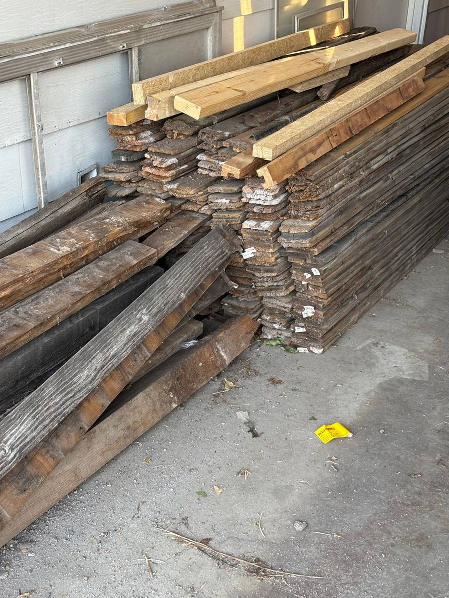 Free Weathered Wood Fence Slats - Large Stack of Reclaimed Lumber for DIY Projects