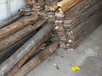 Free Weathered Wood Fence Slats - Large Stack of Reclaimed Lumber for DIY Projects