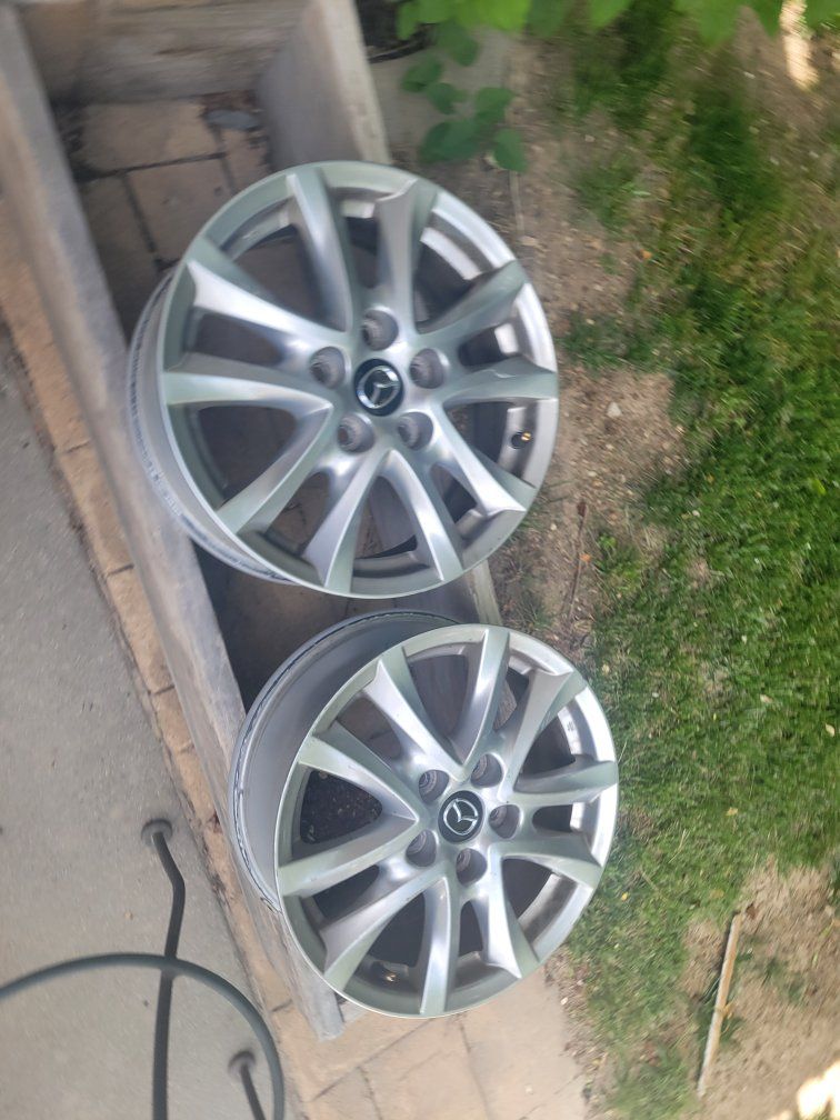 Pair of 16 Mazda 3 Rims w black Mazda Center Caps