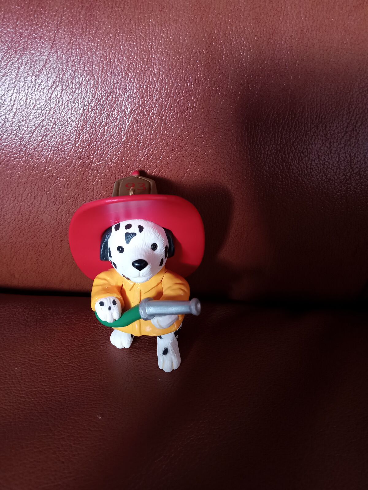 Vintage dalmatian dog firefighter with hose Hallmark statue or pendant