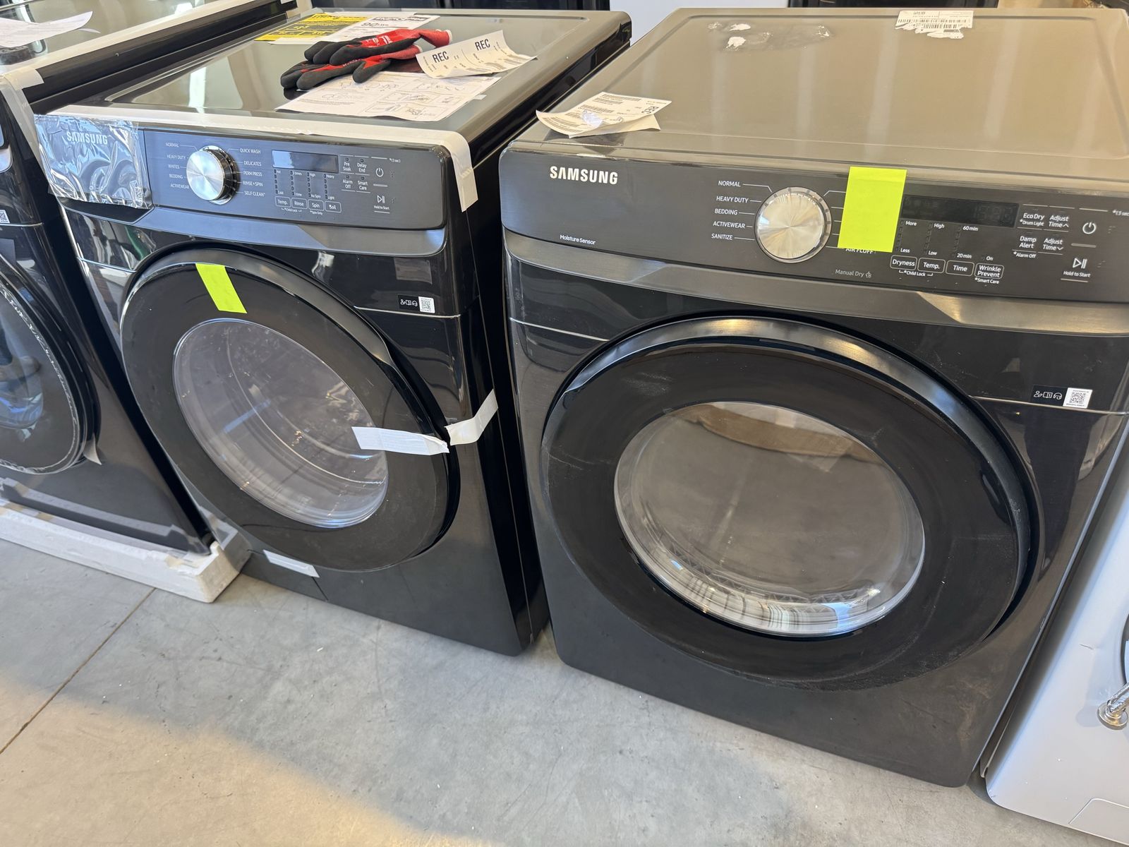 New open box Samsung 4.5 cu. ft. Front Load Washer with Vibration Reduction Technology+ and 7.5 cu. ft. ELECTRIC Dryer