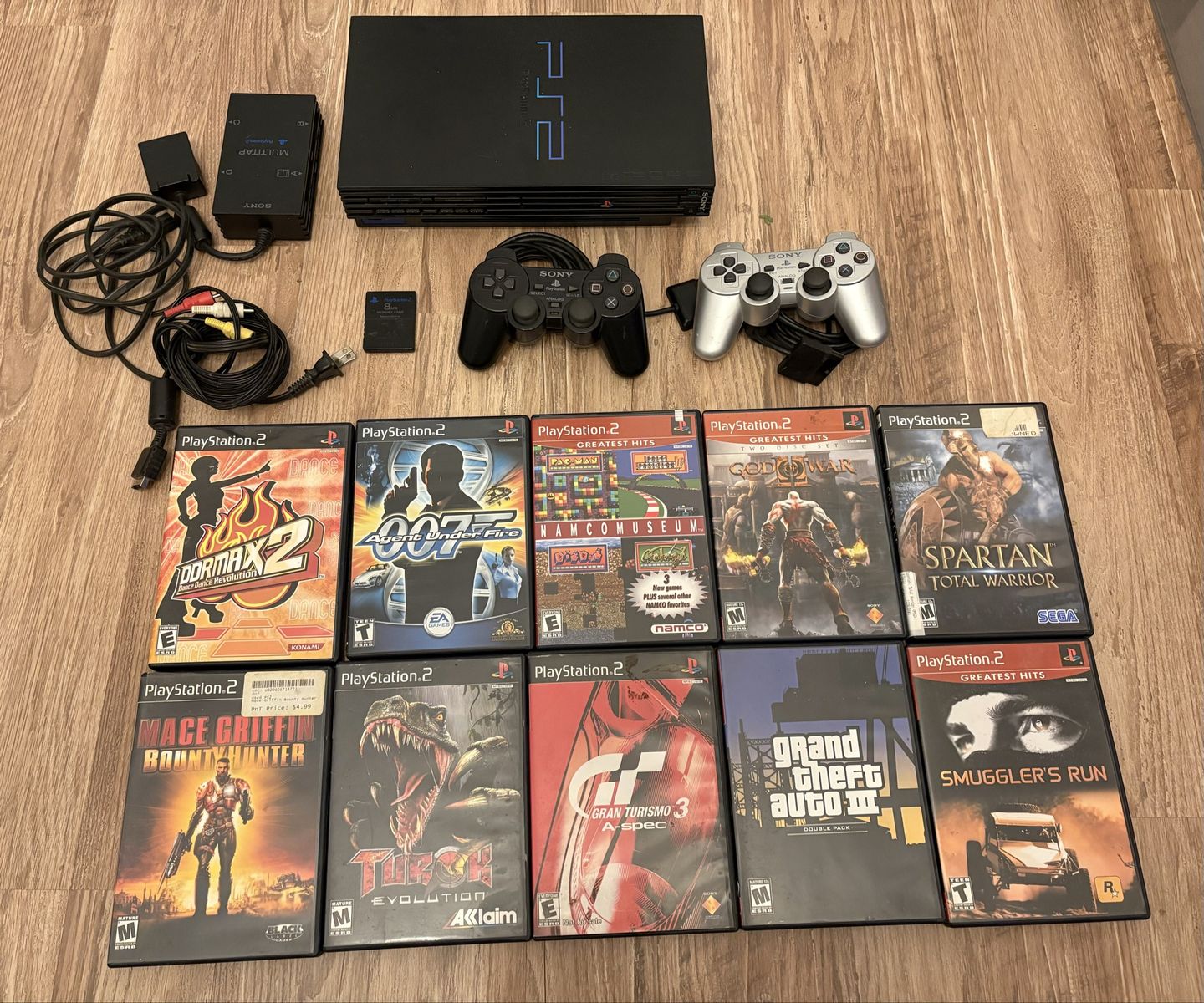 Sony PlayStation 2 (PS2) Bundle with 2 Controllers, 10 Games & more
