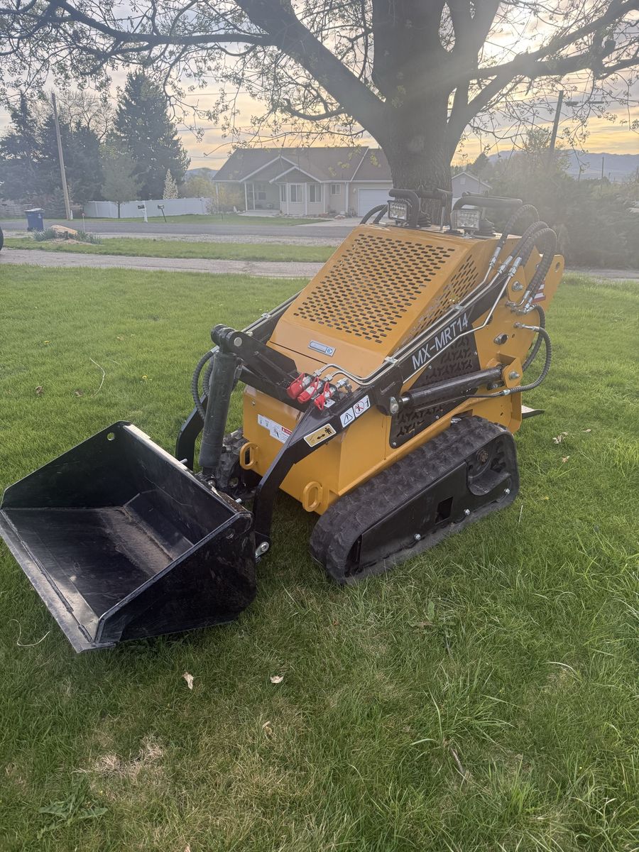 Mini Skid Steer FOR RENT $150 A Day
