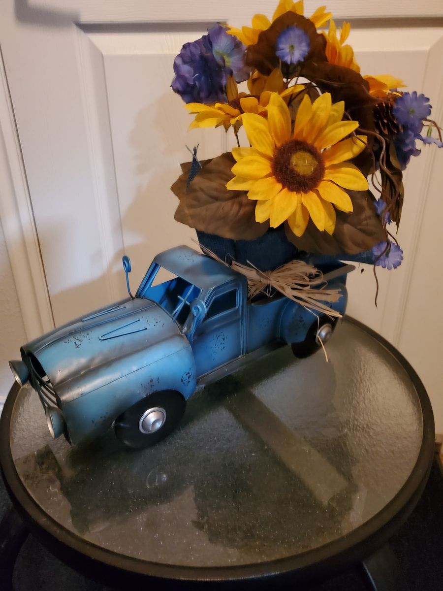 Vintage Style Blue Metal Pickup Truck Planter with Floral Arrangement