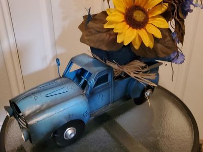 Vintage Style Blue Metal Pickup Truck Planter with Floral Arrangement