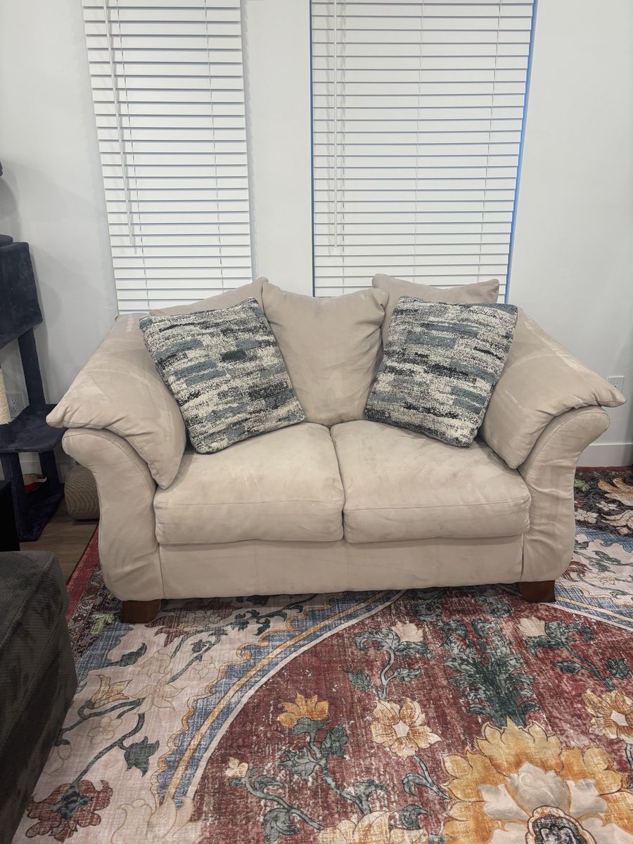 Cozy Beige Loveseat with Patterned Throw Pillows - Compact 2-Seater Sofa