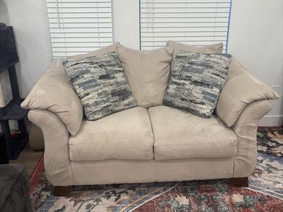 Cozy Beige Loveseat with Patterned Throw Pillows - Compact 2-Seater Sofa
