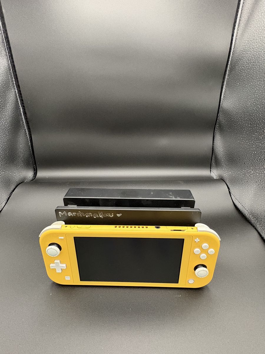 Nintendo Switch Lite-yellow with carry case and switch dock $180 cash/venmo in Draper