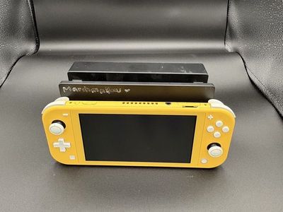 Nintendo Switch Lite-yellow with carry case and switch dock $180 cash/venmo in Draper