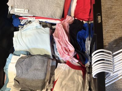 Brand new Youth, toddler t-shirts and onesies. A few crew neck sweatshirts.