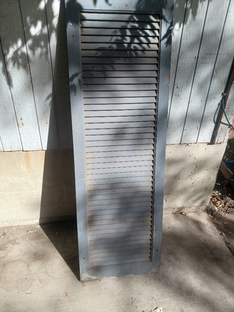 Outdoor wood window shutters