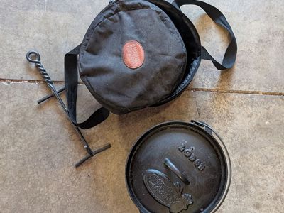Lodge Cast Iron Dutch Oven with Lid Lift Handle and Camping Carry Case