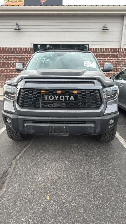 2021 Toyota Tundra Limited — rebuilt & branded title, 9% below market