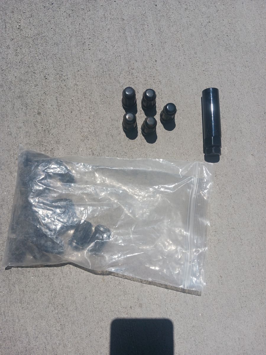 Six Spline black lug nuts and socket fits Subaru