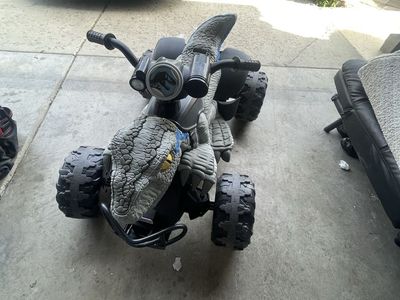 Power wheel Jurassic world Dino racer