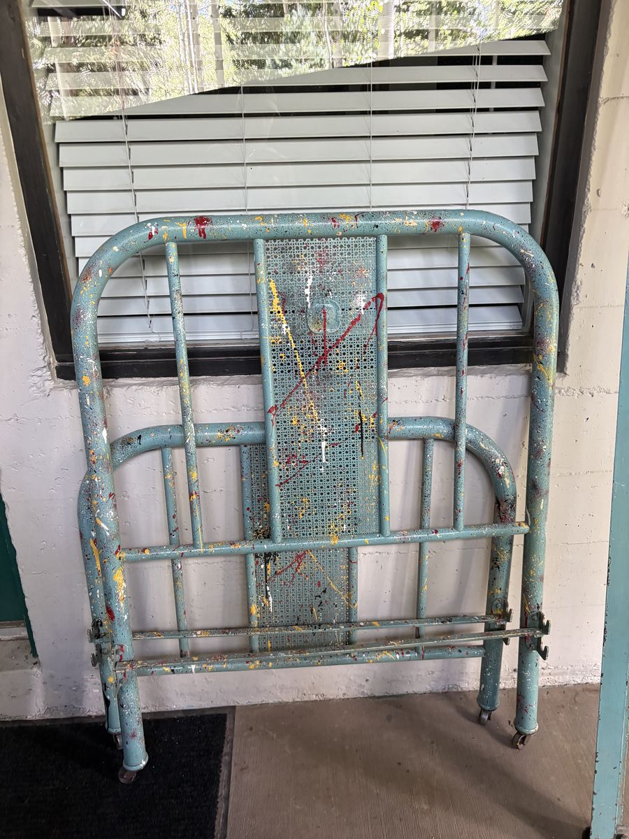 Vintage metal bed frame with slats