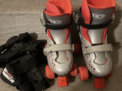 Kids roller blades w/ pads
