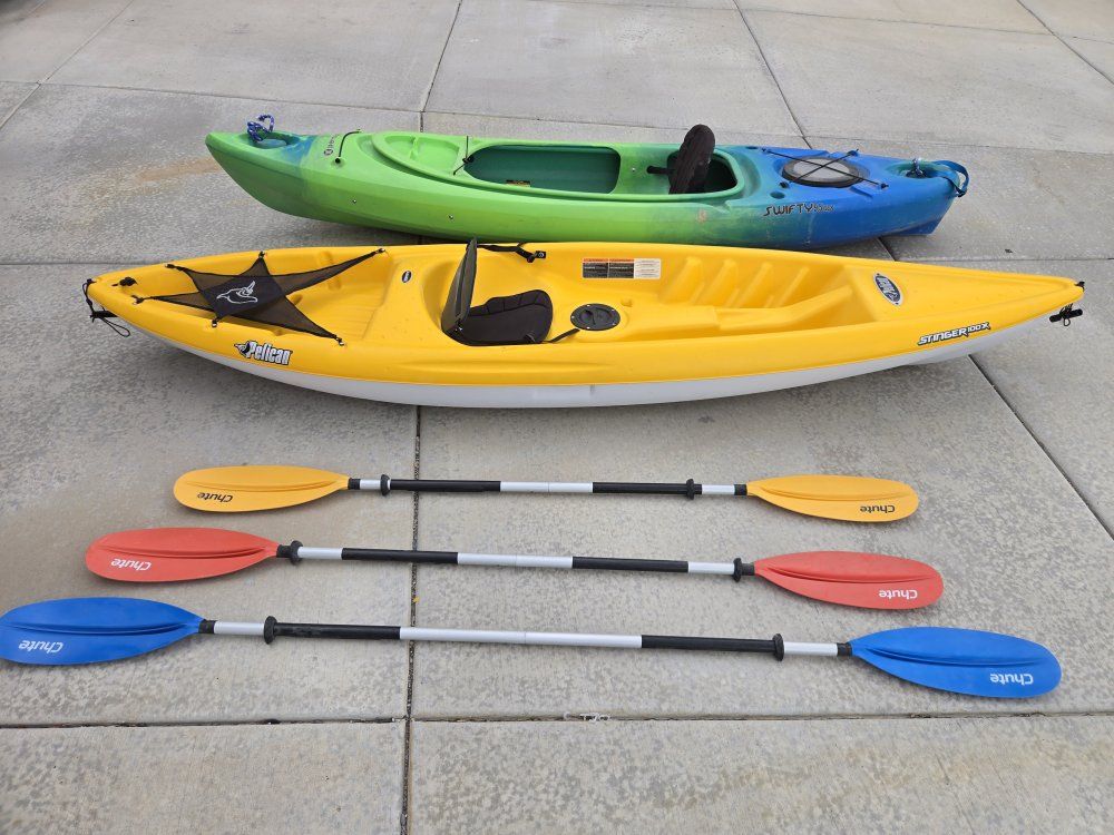 Pelican Stinger 100X and Perception Swifty 9.5 Kayaks with Paddles