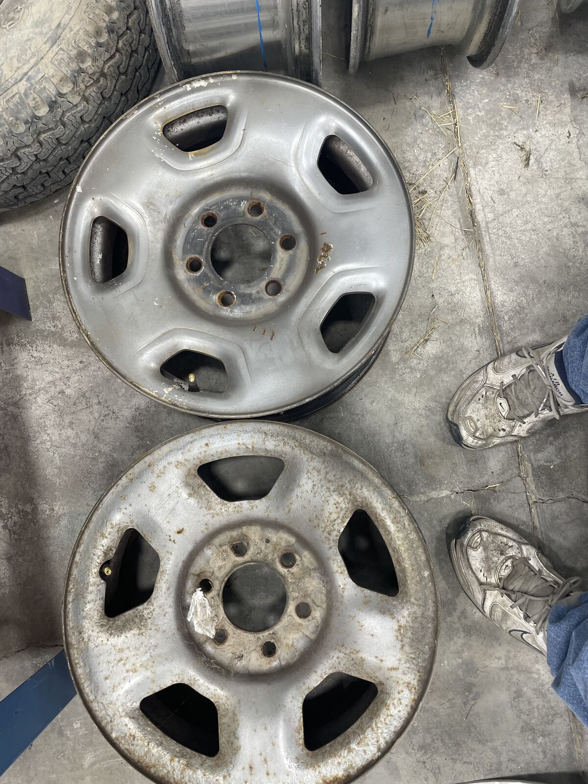 Two Chevy GMC six lug steel wheels