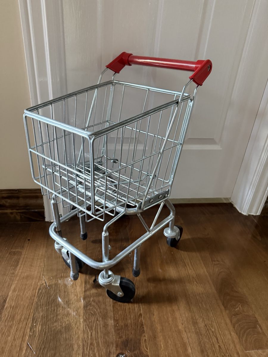 Kids metal shopping cart with extra wheels for stability