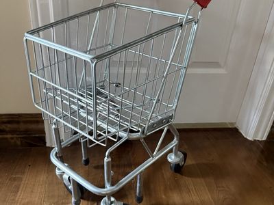 Kids metal shopping cart with extra wheels for stability