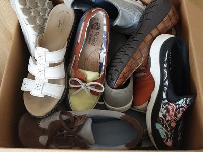 Women's shoes in complete pairs.