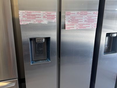 New Scratch and dent Samsung 27.4 cu. ft. Standard Depth Side-by-Side Refrigerator