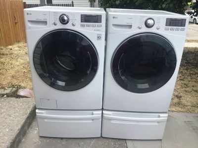 Beautiful LG WhiteSuper Capacity Washer & Electric Dryer Set Steam & Sensor Dry includes pedestals plus free delivery!